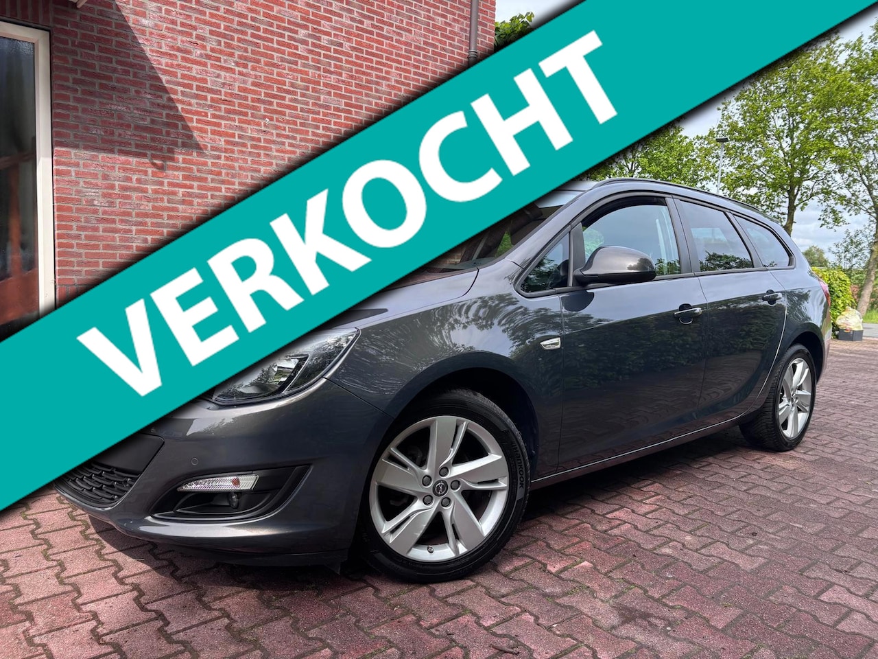 Opel Astra Sports Tourer - 1.4 Edition 1.4 Edition - AutoWereld.nl