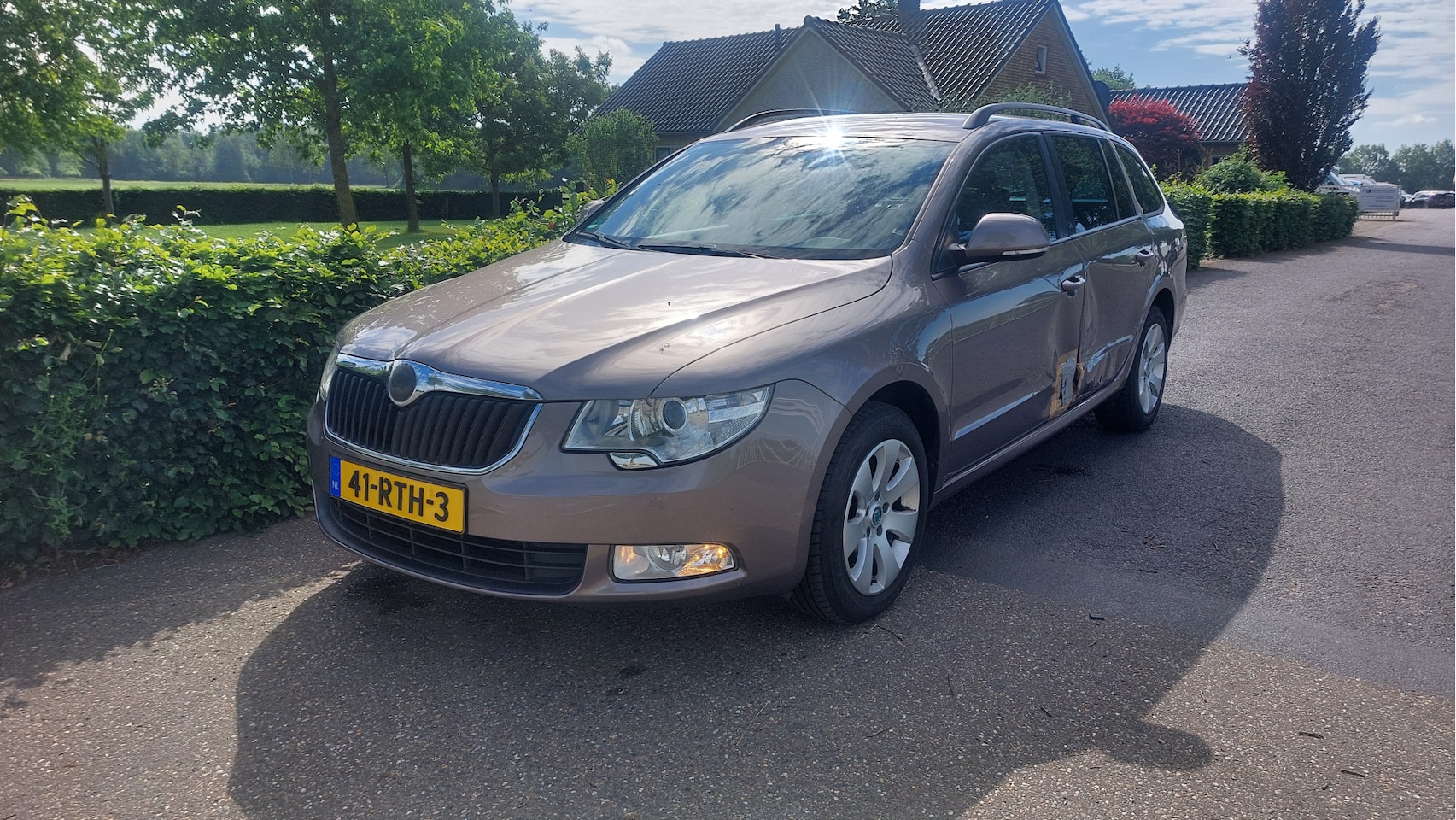 Skoda Superb Combi - 1.4 TSI Comfort Business Line CLIMA/NAVI BJ 2011 - AutoWereld.nl
