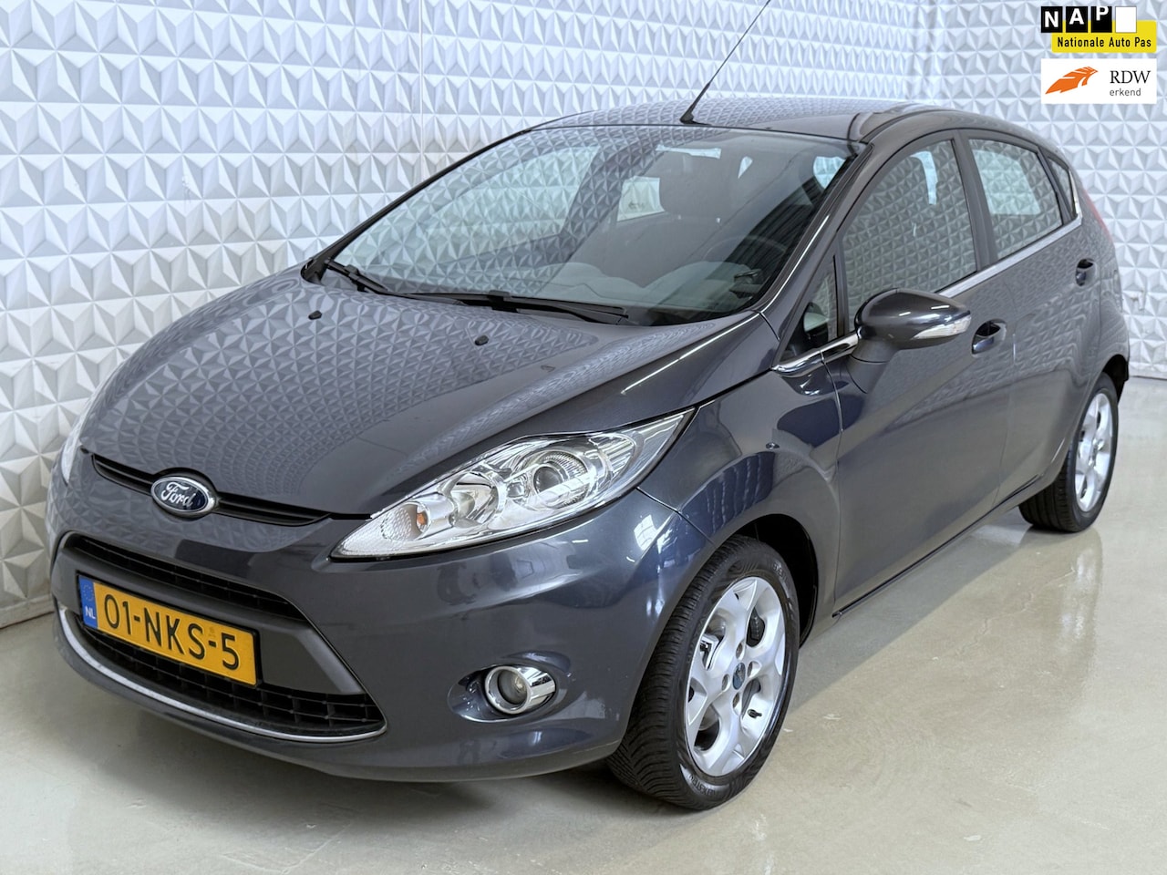 Ford Fiesta - 1.25 Titanium CLIMA-CRUISE-PDC-TREKHAAK (2010) - AutoWereld.nl