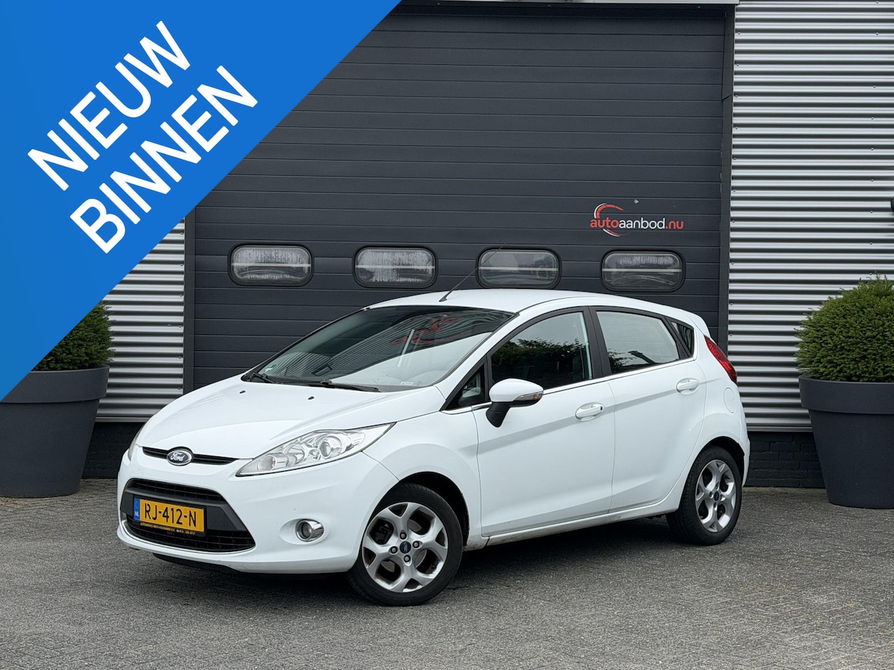 Ford Fiesta - 1.4 Ghia | Airco | Climate Control | Lichtmetalen Velgen | 5 Deurs | - AutoWereld.nl