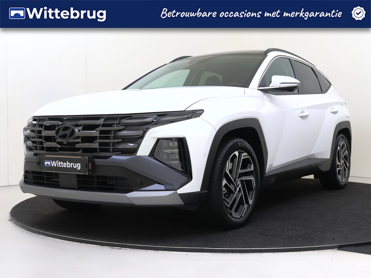 Hyundai Tucson - 1.6 T-GDI PHEV Premium Sky UITVERKOOP DEAL!! | Open dak | Lederen bekleding | P4 - AutoWereld.nl