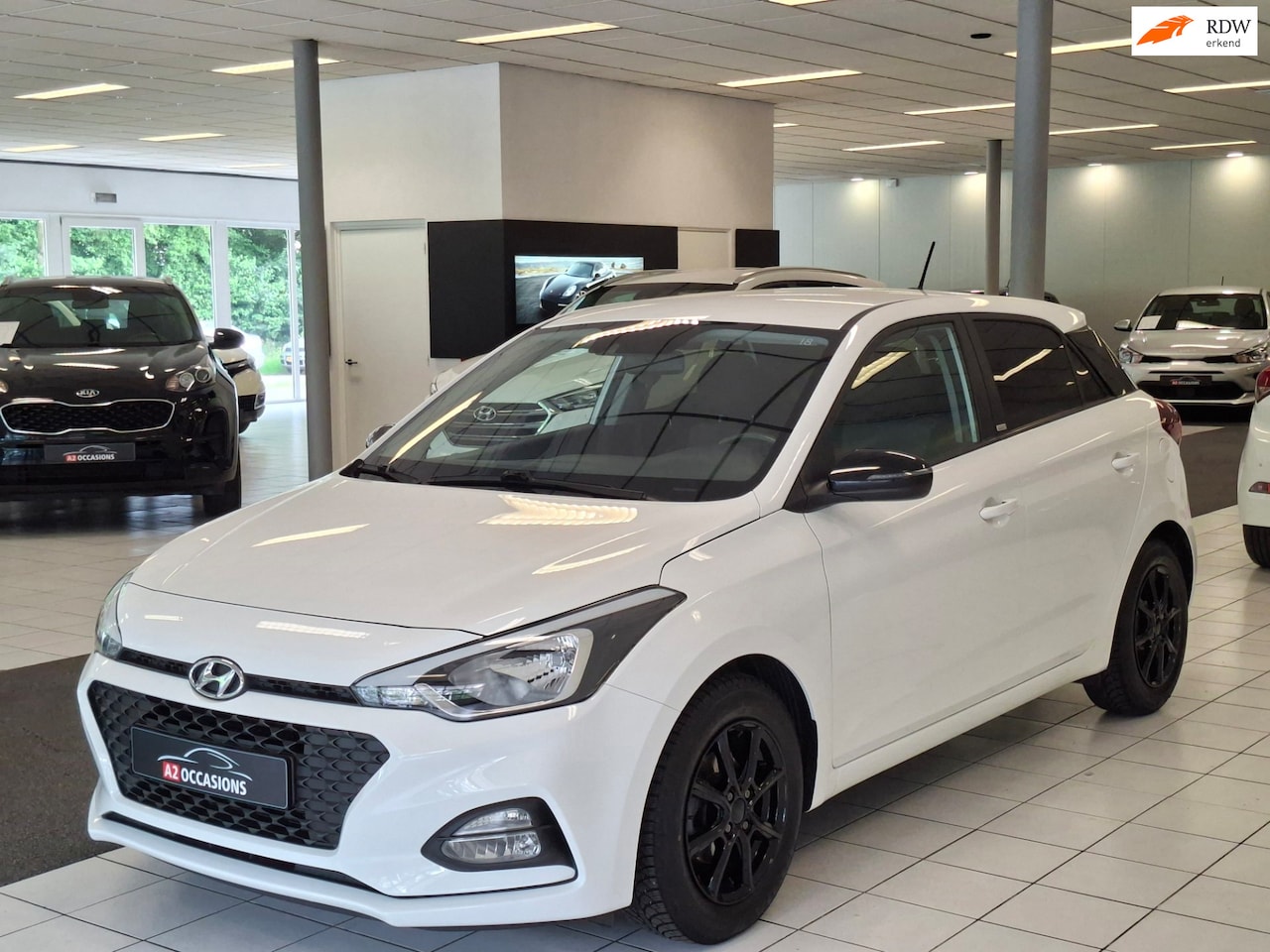 Hyundai i20 - 1.2 (4 cil) Cruise/Carplay/Android auto/Camera/Stoel en stuurverwarming - AutoWereld.nl