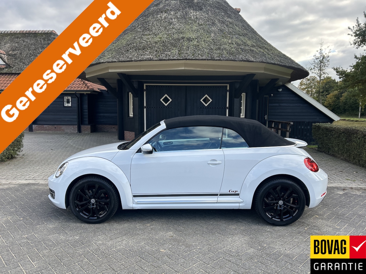 Volkswagen Beetle Cabriolet - 1.2 TSI Design BlueMotion Cup 18 Lm Clima Cruise Pdc Stoelverwarming - AutoWereld.nl