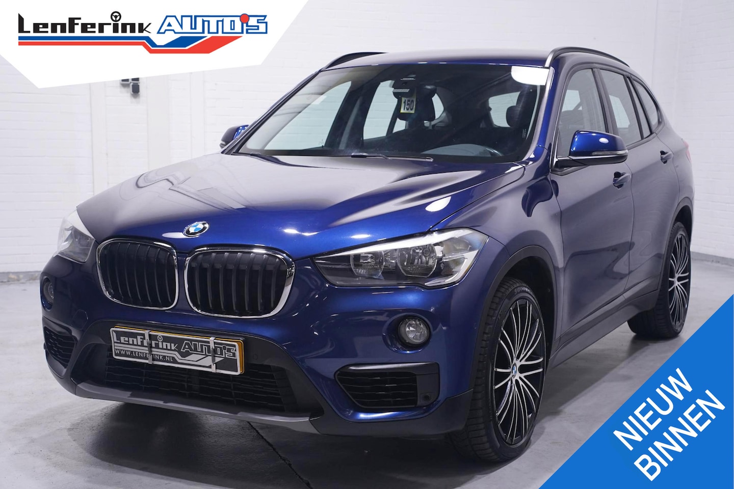 BMW X1 - sDrive18i Advantage Navi Sportstoelen Clima Stoelverwarming PDC v+a - AutoWereld.nl