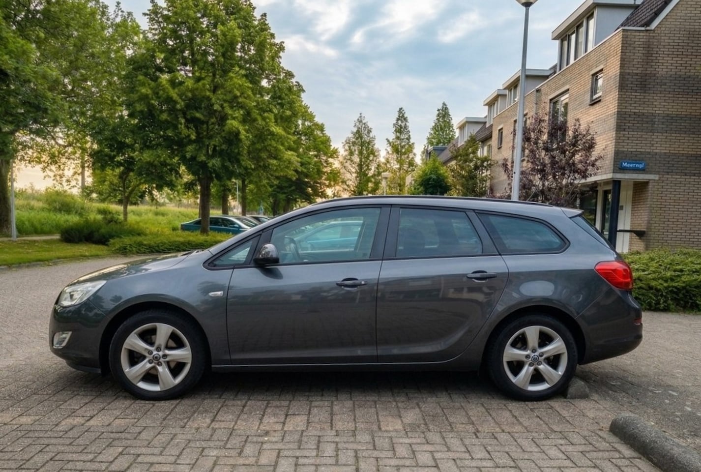 Opel Astra Sports Tourer - 1.4 Edition - AutoWereld.nl