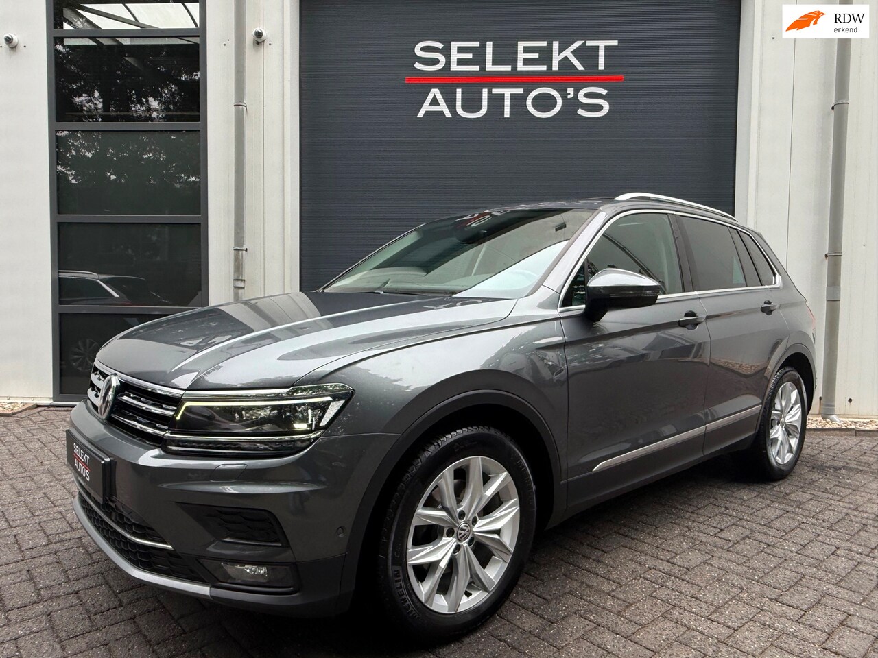 Volkswagen Tiguan - 1.5 TSI ACT Highline 150 Pk DSG BTW Pano/Virtual/Leder/LED/18 Inch/Trekhaak/Camera/Climate - AutoWereld.nl