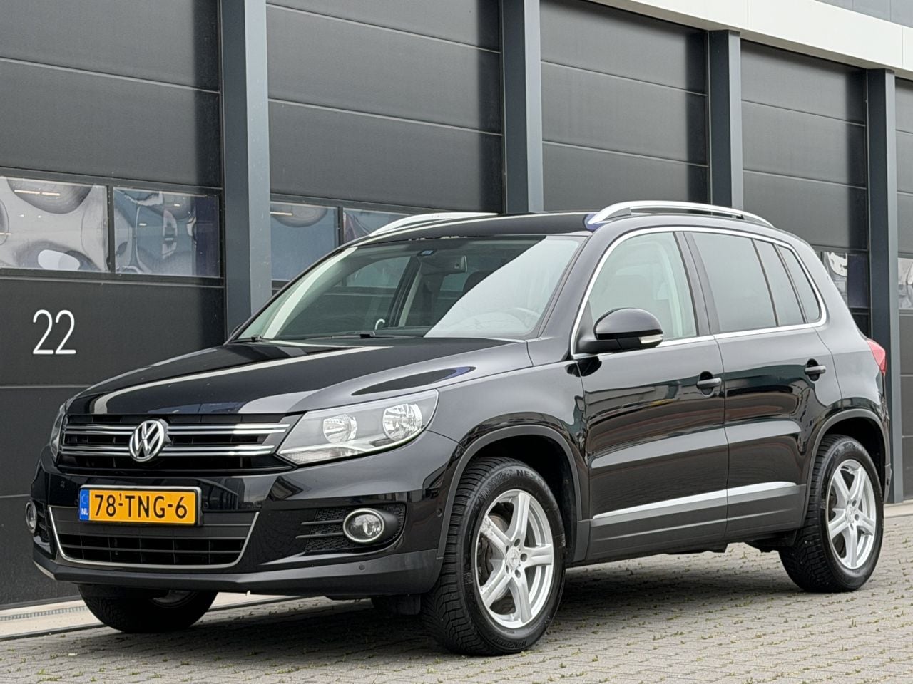 Volkswagen Tiguan - 2.0 TDI Sport&Style Navi Clima PDC - AutoWereld.nl