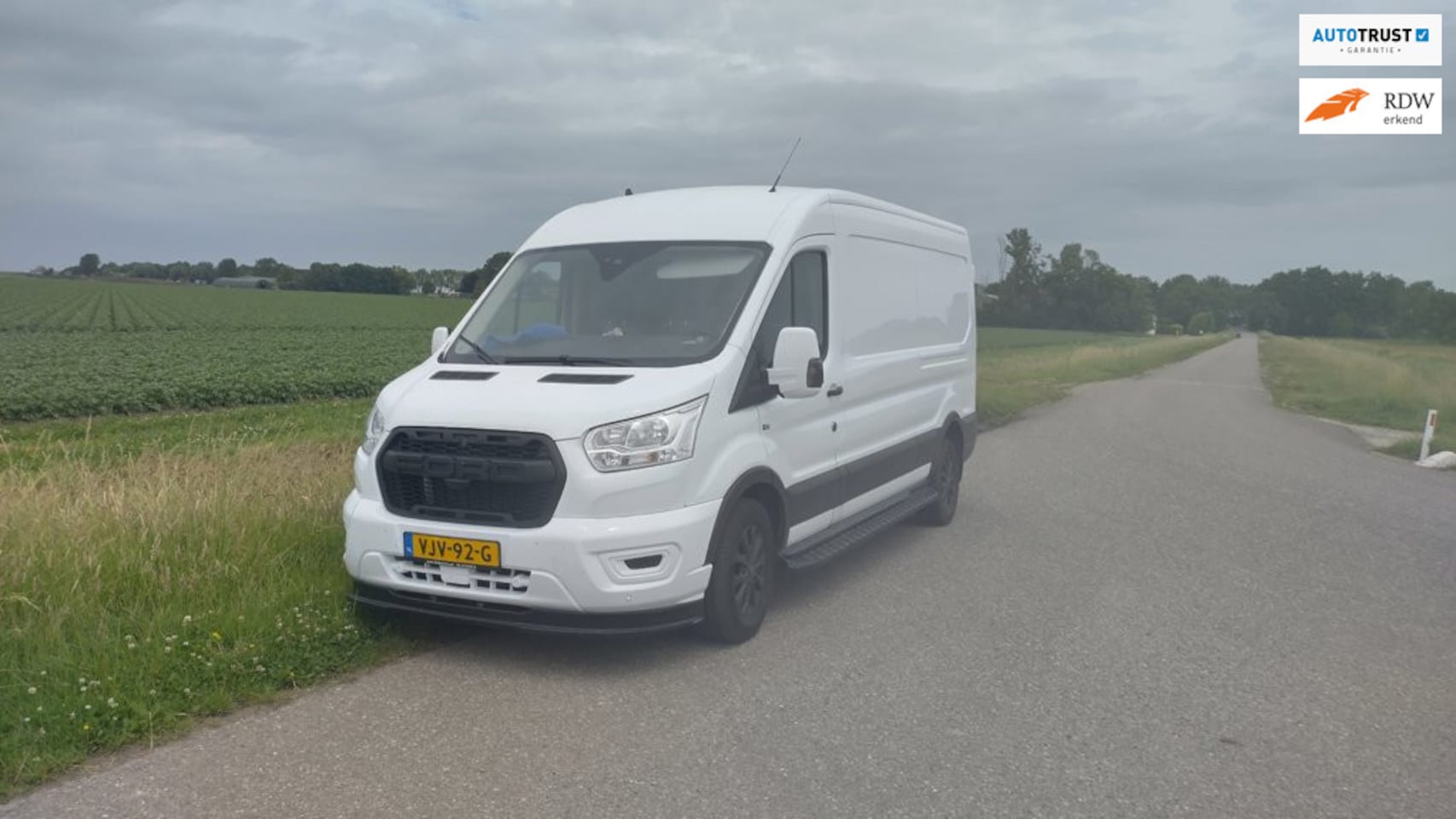 Ford Transit - 350 2.0 TDCI L3H2 Aut, led, raptor 3500kg trekhaak black edition - AutoWereld.nl