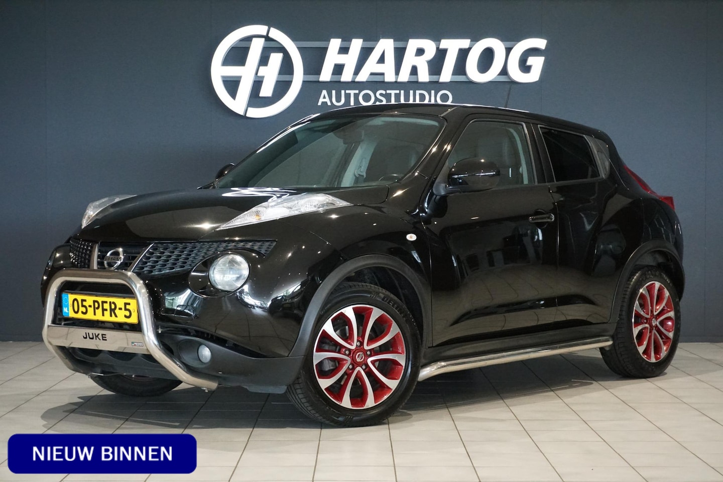 Nissan Juke - 1.6 Tekna + LEDER / CAMERA / NAVI / TREKHAAK - AutoWereld.nl