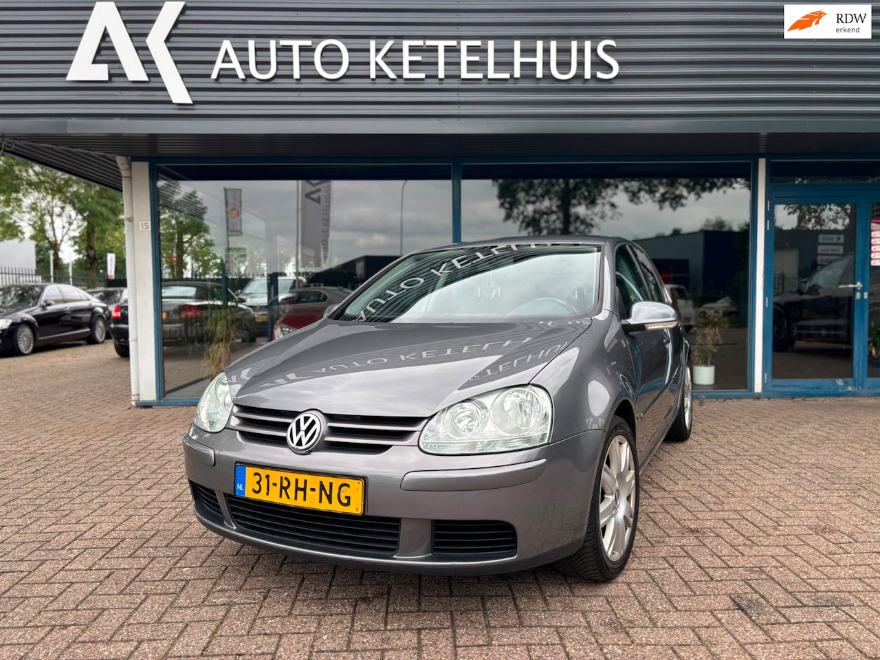 Volkswagen Golf - 1.6 FSI Sportline 1.6 FSI Sportline - AutoWereld.nl