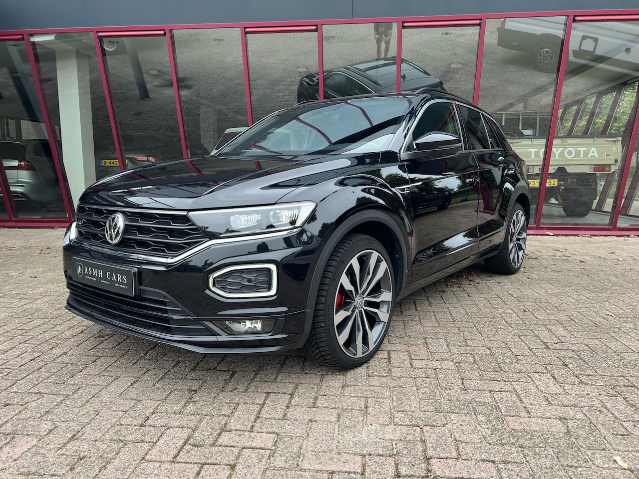 Volkswagen T-Roc - 2.0 TSI 4Motion Sport Business R | ACC | PDC | LED | Trekhaak | Pano | Camera | Winter pak - AutoWereld.nl