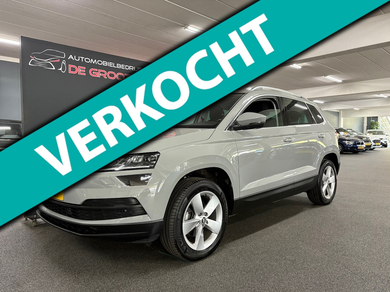 Skoda Karoq - 1.5 TSI ACT Business Edition/ NL auto/ Achteruitrijcamera/ Parkeersensoren voor en achter - AutoWereld.nl