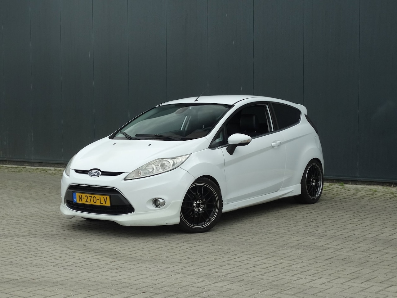 Ford Fiesta - 1.6 Ghia Airco Lm velgen Leer Vaste prijs - AutoWereld.nl