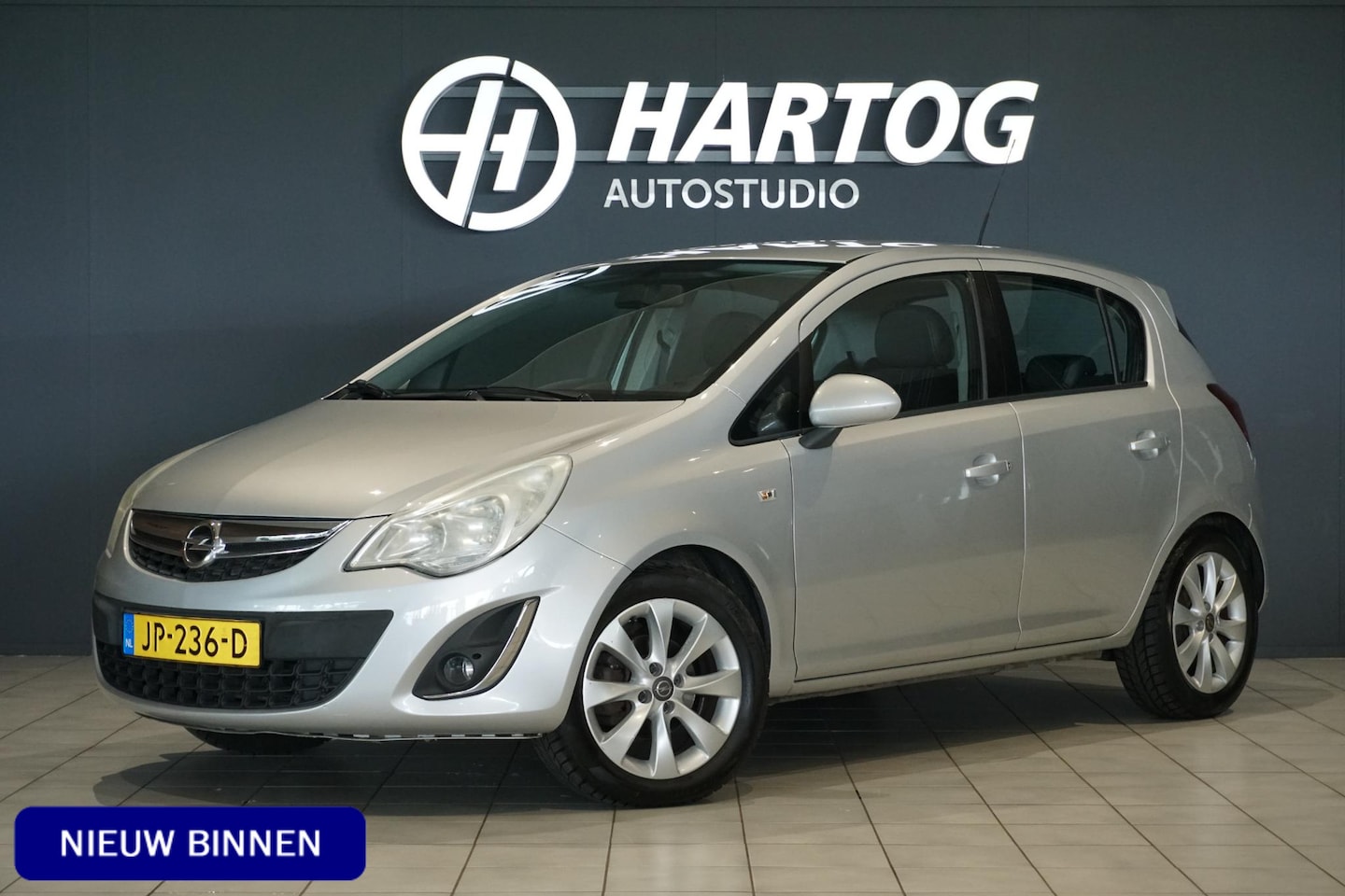 Opel Corsa - 1.4-16V Anniversary Edition + CRUISE CONTROL / HALF LEDER / 16'' LMV - AutoWereld.nl