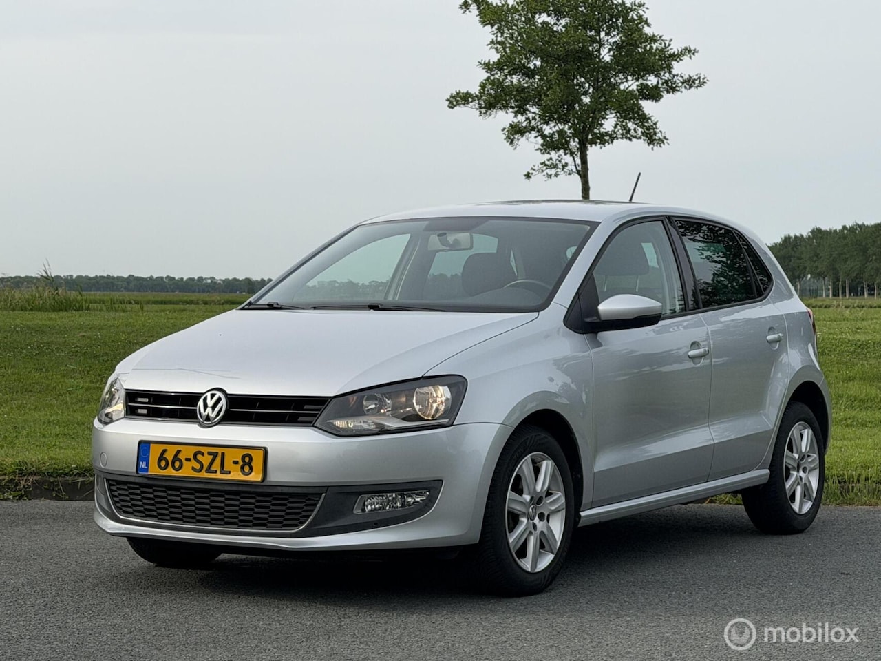 Volkswagen Polo - 1.2 TSI Comfortline | Navi | Cruise | - AutoWereld.nl