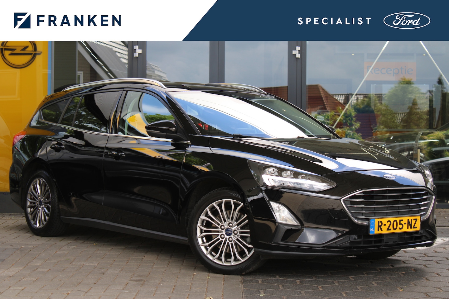 Ford Focus Wagon - 1.0 EcoBoost Titanium Business | Achteruitrijcamera | Stoelverwarming | Stuurverwarming - AutoWereld.nl