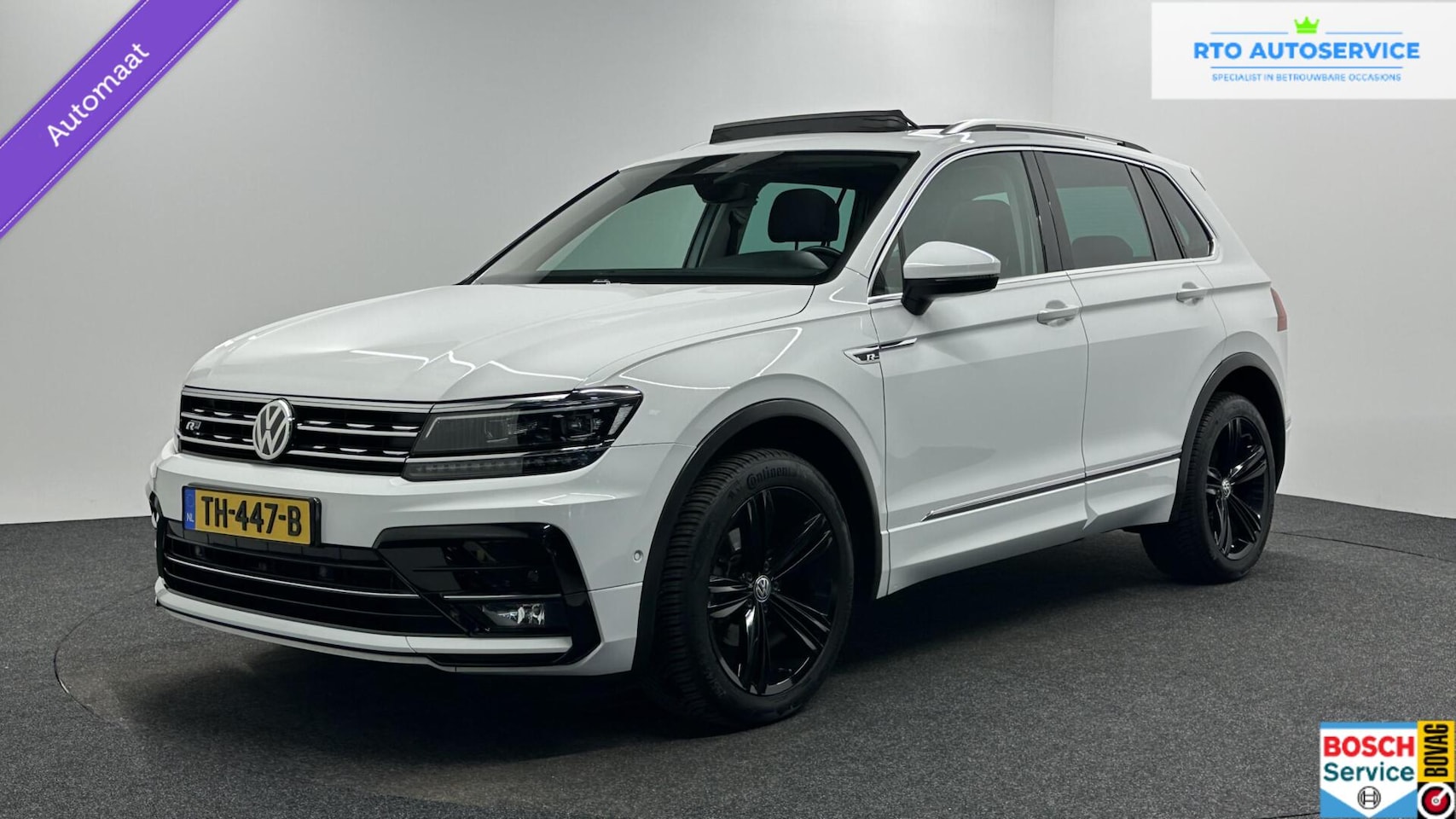 Volkswagen Tiguan - 1.4 TSI 4Motion Highline Business R PANO CAMERA NAVI CRUISE CARPLAY. - AutoWereld.nl