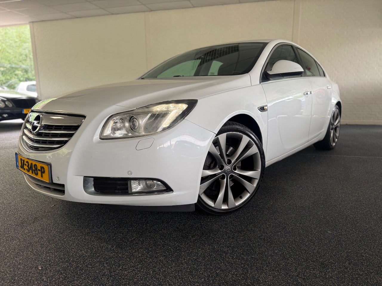 Opel Insignia - 2.8 T V6 Cosmo 4x4 | Bi Xenon | LMV 20” | Half Leder | Cruise | PDC | - AutoWereld.nl