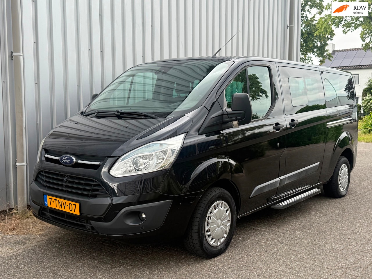 Ford Transit Custom Tourneo - 300 2.2 TDCI L2H1 Titanium / 9pl / 2x schuifdeuren - AutoWereld.nl