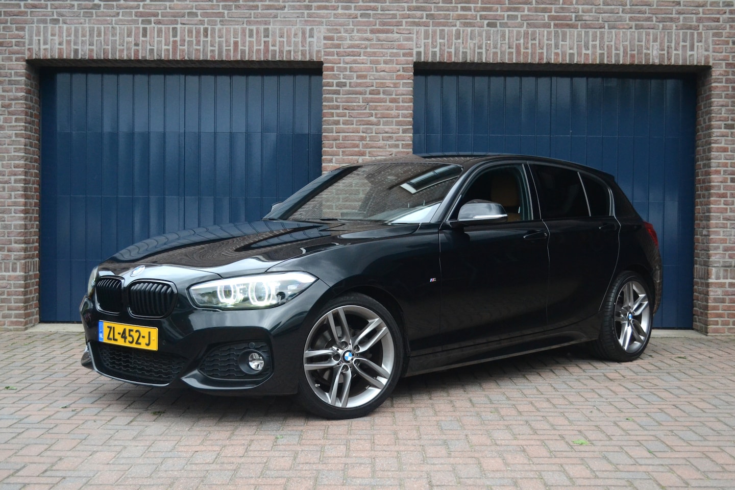 BMW 1-serie - 118i Edition M-Sport Shadow High Executive | Leder | Stoelverwarming | Getint glas - AutoWereld.nl