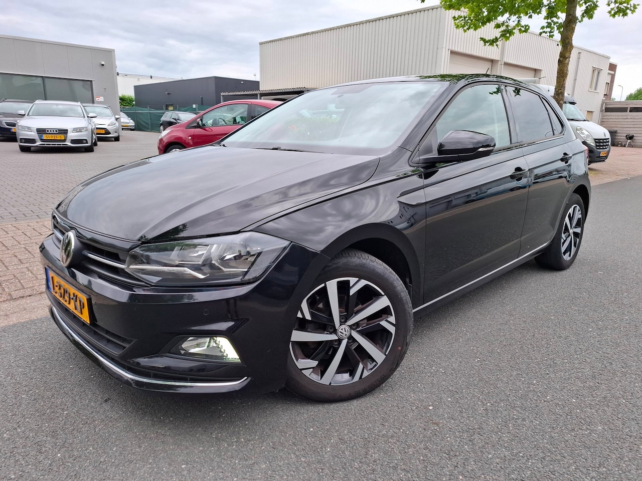 Volkswagen Polo - 1.0 TSI AUTOMAAT/AIRCO/NAVI/PDC! - AutoWereld.nl