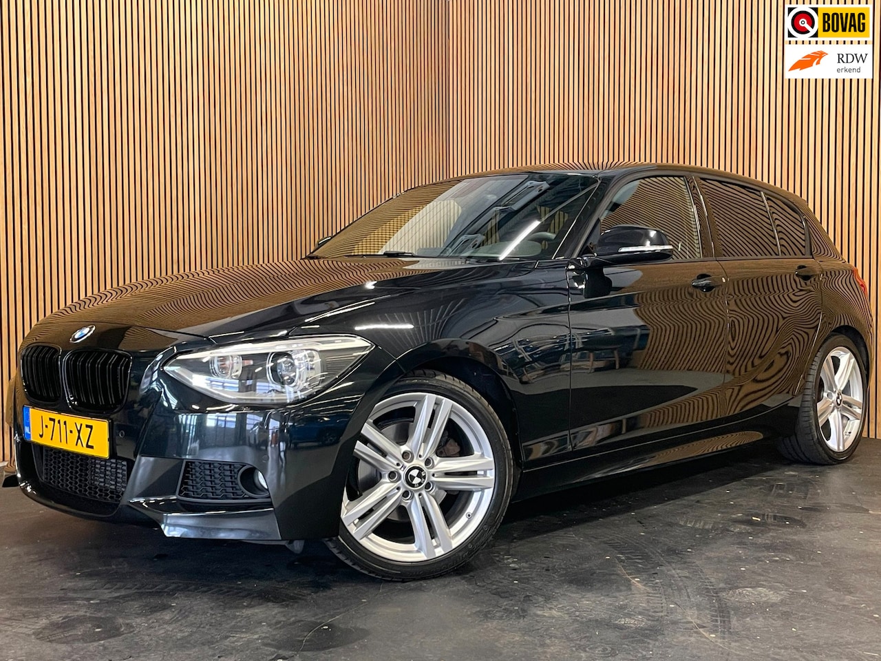 BMW 1-serie - 118i M Sport Edition High Executive|BLACK-EDITION|M-PAKKET|AUTOMAAT|AFN.TREKHAAK|CLIMA+CRU - AutoWereld.nl