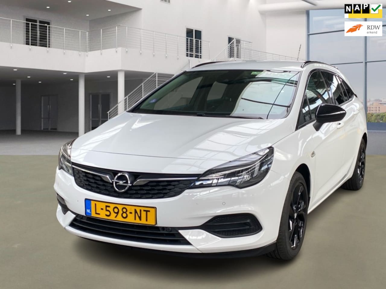 Opel Astra Sports Tourer - 1.2 Business Elegance|BJ2021|6BAK|NAVI|CAMERA|XENON|HALFLEDER - AutoWereld.nl