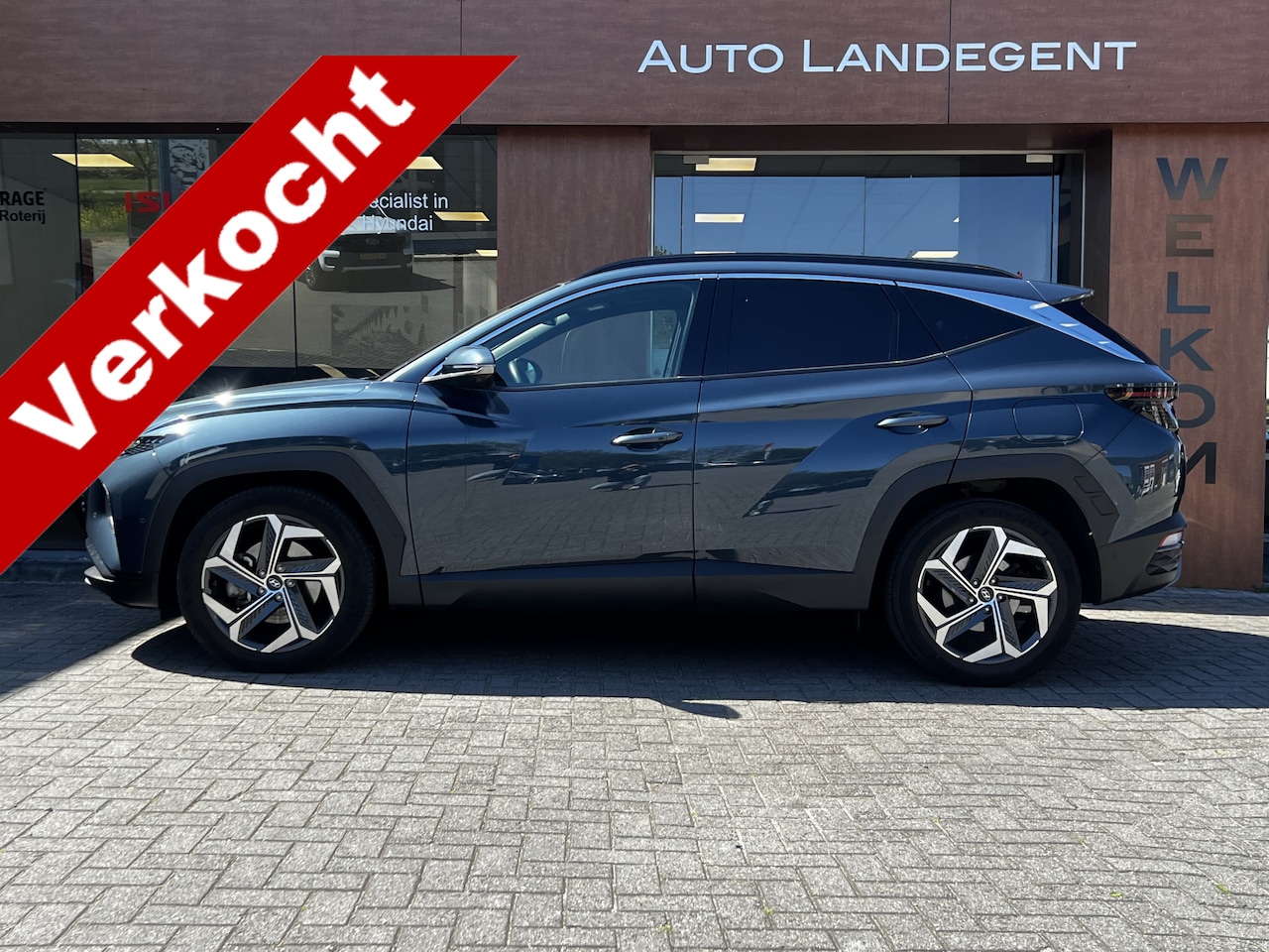 Hyundai Tucson - 1.6 T-GDI HEV Premium Sky | Automaat | 360 Cam. | Panoramadak | Trekhaak - AutoWereld.nl