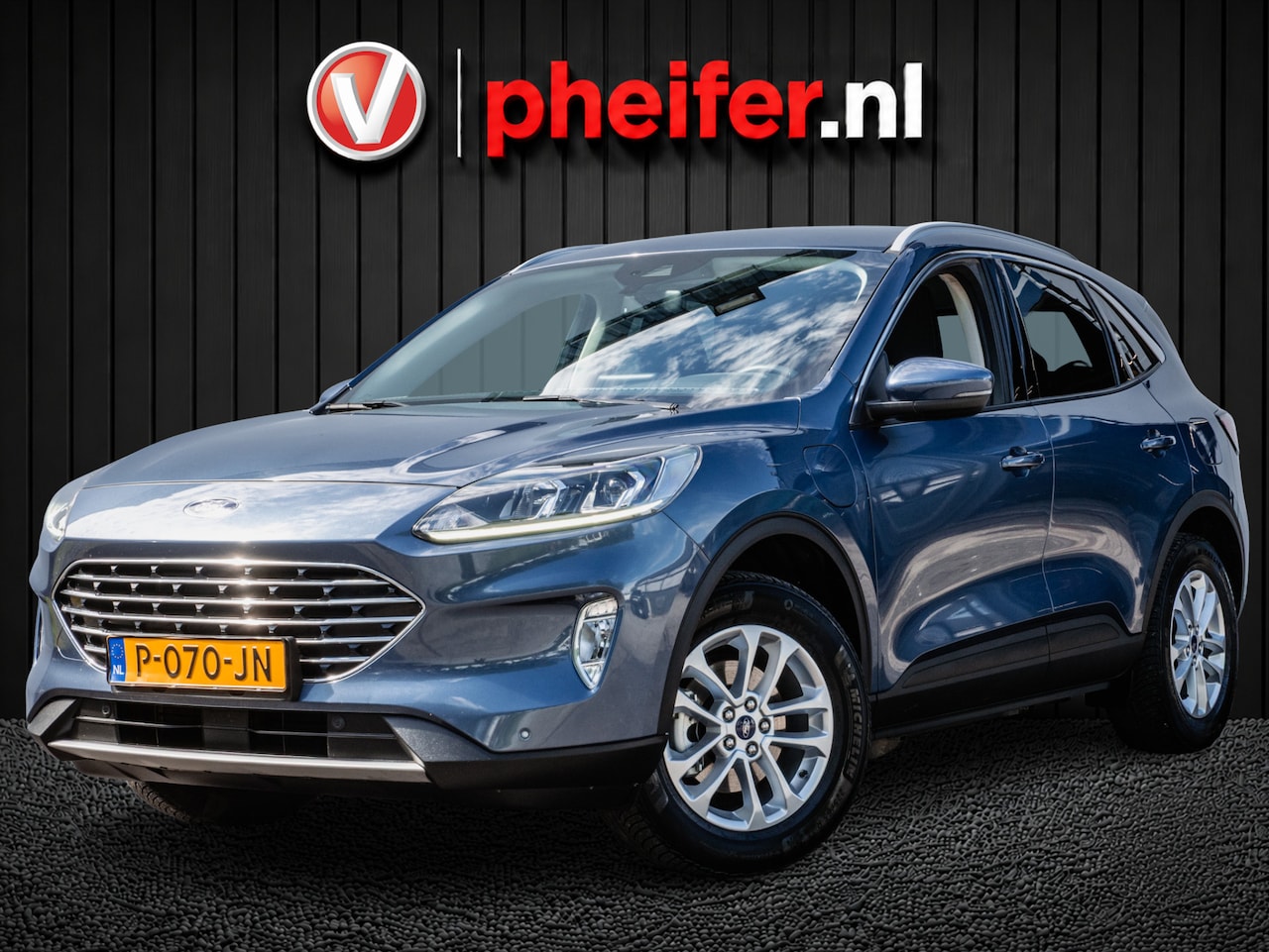Ford Kuga - 2.5 PHEV Titanium Navigatie/ Dab/ Camera/ Carplay/ Keyless/ Cruise control - AutoWereld.nl