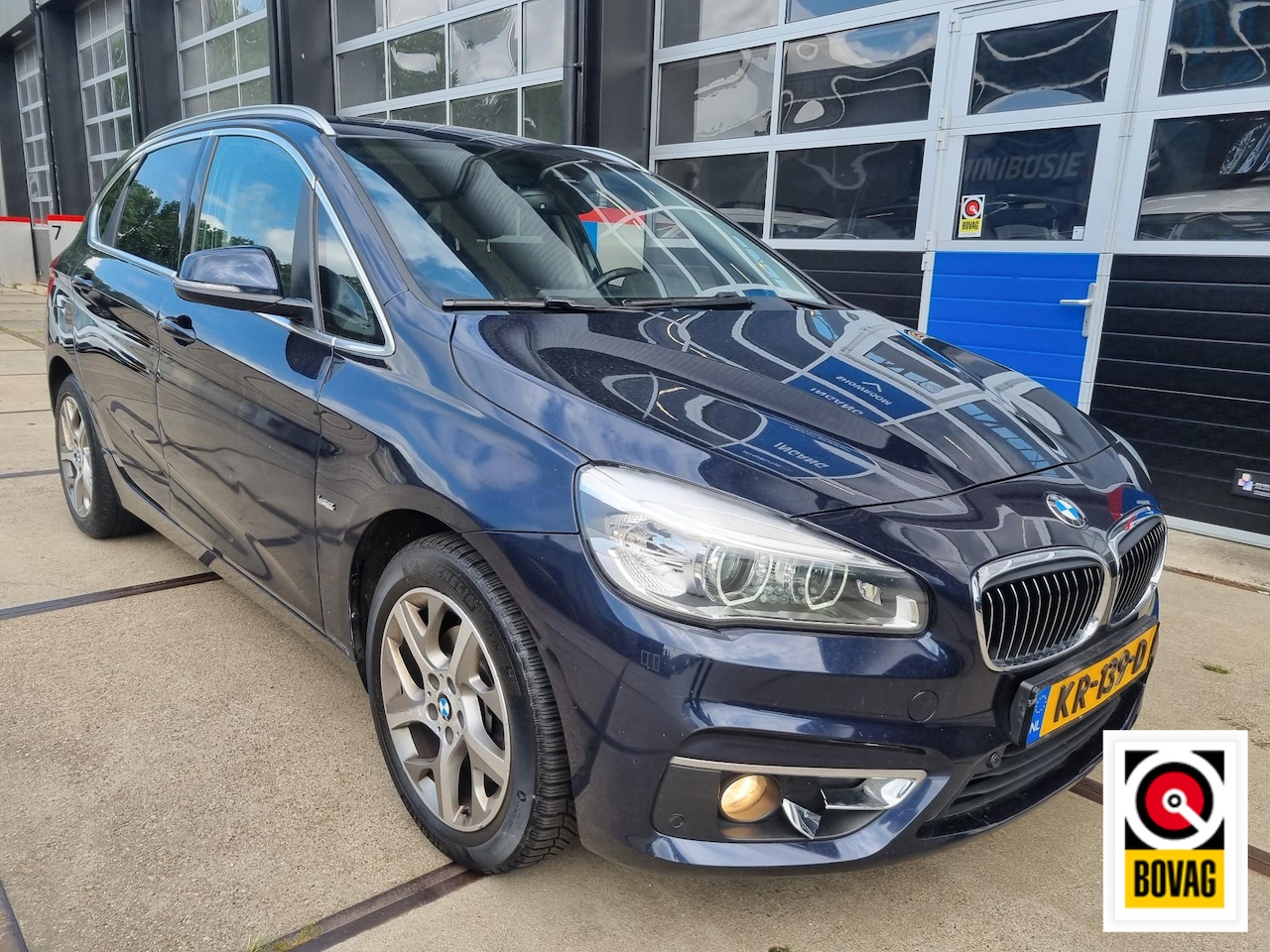BMW 2-serie Active Tourer - 218d Luxury LEER / NAVI / CAMERA / CRUISE / PDC - AutoWereld.nl