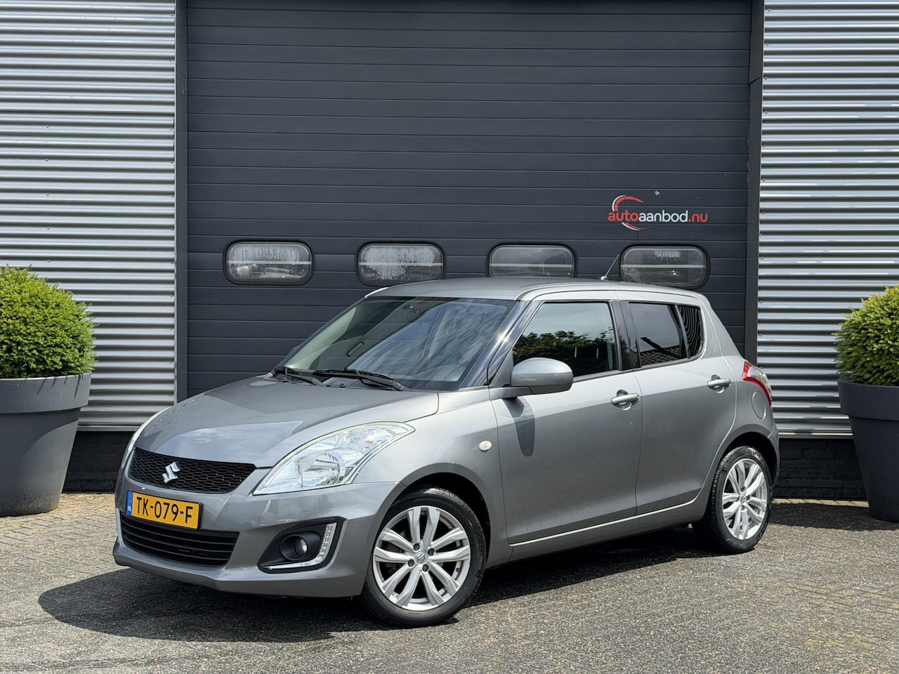 Suzuki Swift - 1.2 Exclusive | Airco | Lichtmetalen Velgen | Cruise Control | - AutoWereld.nl