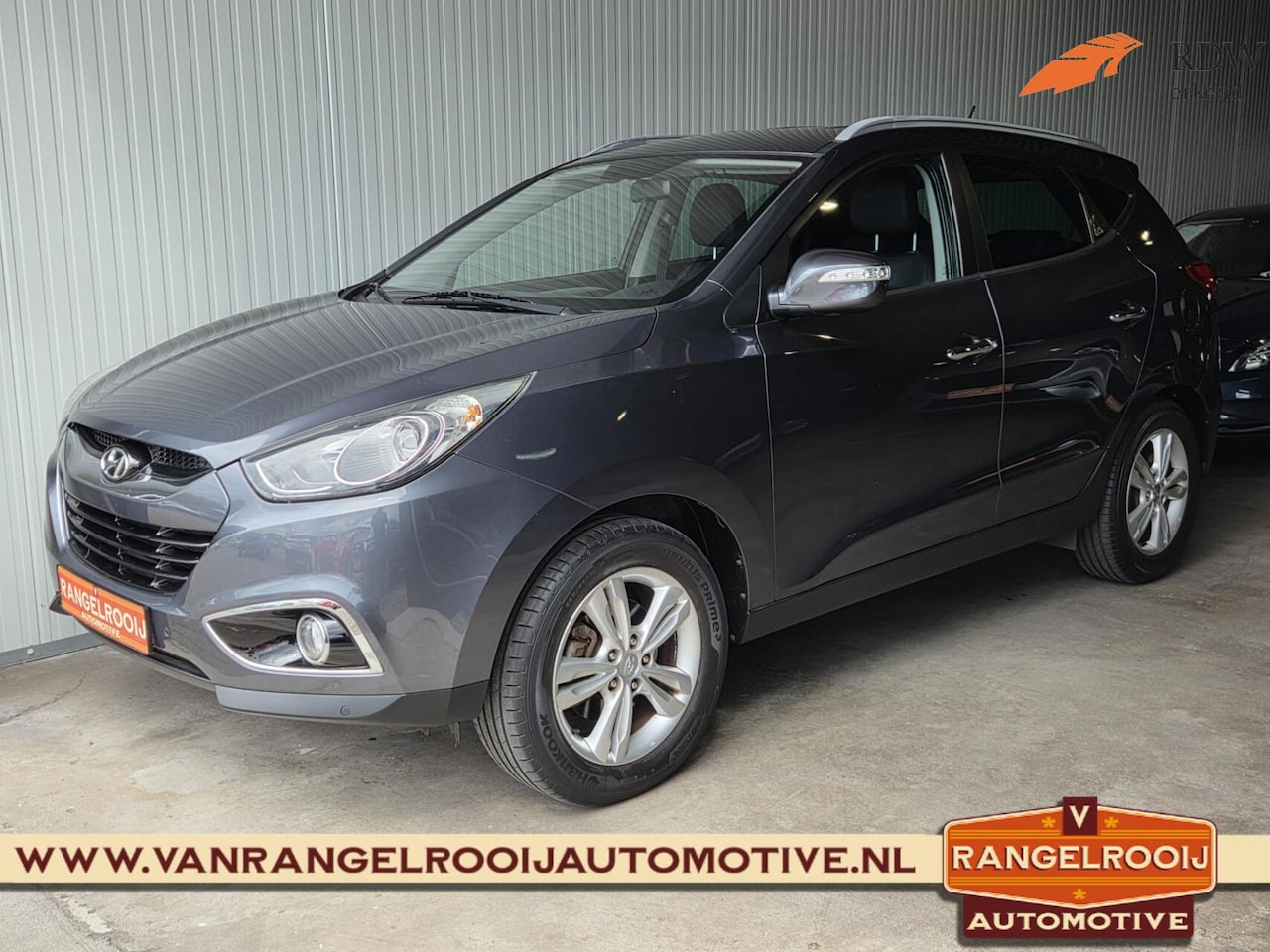 Hyundai ix35 - 2.0i Style 2.0i Style, clima, cruise, pdc v+a, 17" lmv, half leer - AutoWereld.nl