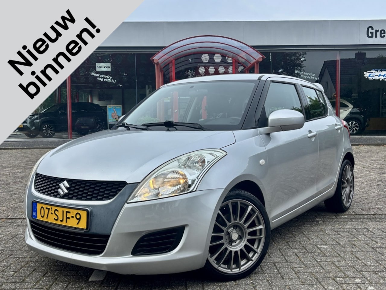 Suzuki Swift - 1.2 Comfort EASSS | Airco | Stoelverwarming | 17'' Lmv - AutoWereld.nl
