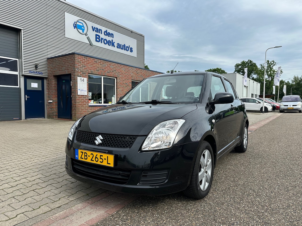 Suzuki Swift - 1.3 Base AIRCO/TREKHAAK/LM VELGEN/STOELVERWARMING/ - AutoWereld.nl