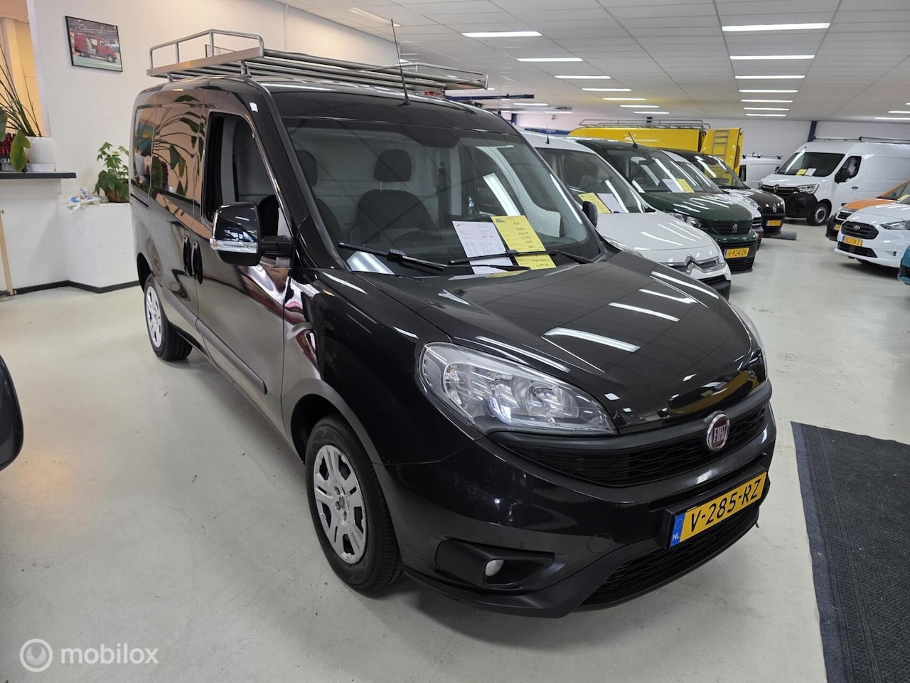 Fiat Doblò Cargo - 1.3 MJ L1 Airco Cruise Navi - AutoWereld.nl