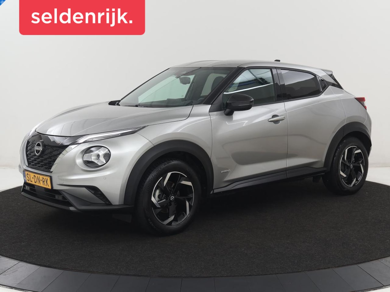 Nissan Juke - 1.6 Hybrid Tekna | 360 Camera | Adaptive cruise | Carplay | Navigatie | Half leder | Full - AutoWereld.nl