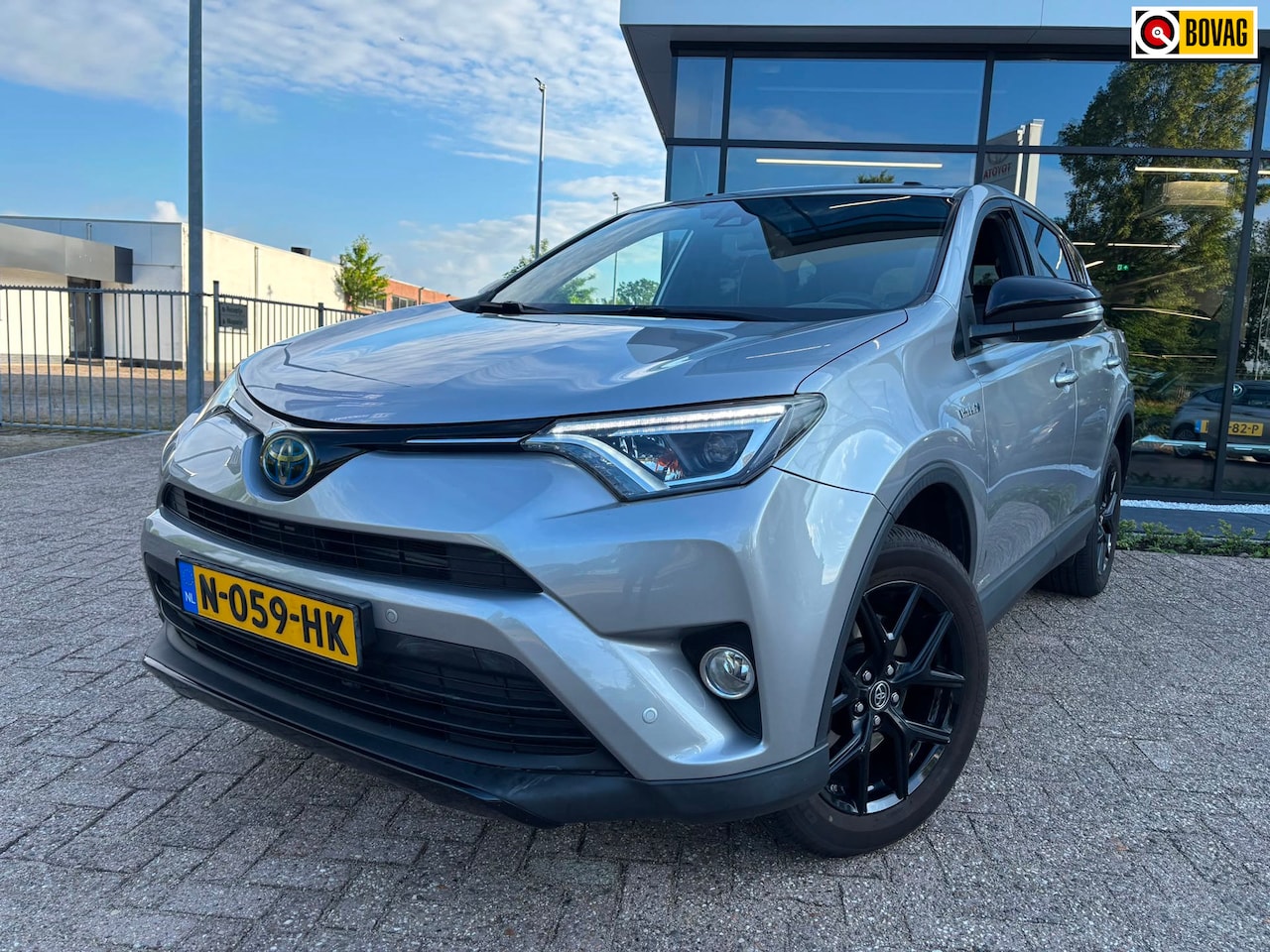Toyota RAV4 - 2.5 Hybrid AWD Style|Trekhaak|Half leder - AutoWereld.nl