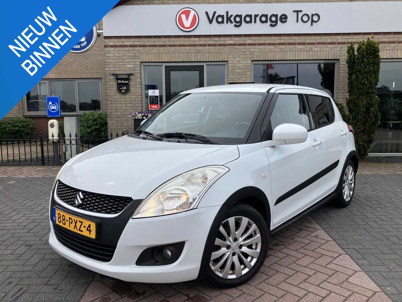 Suzuki Swift - 1.2 Exclusive EASSS | Trekhaak | Cruise | Stoelverwarming | NAP - AutoWereld.nl