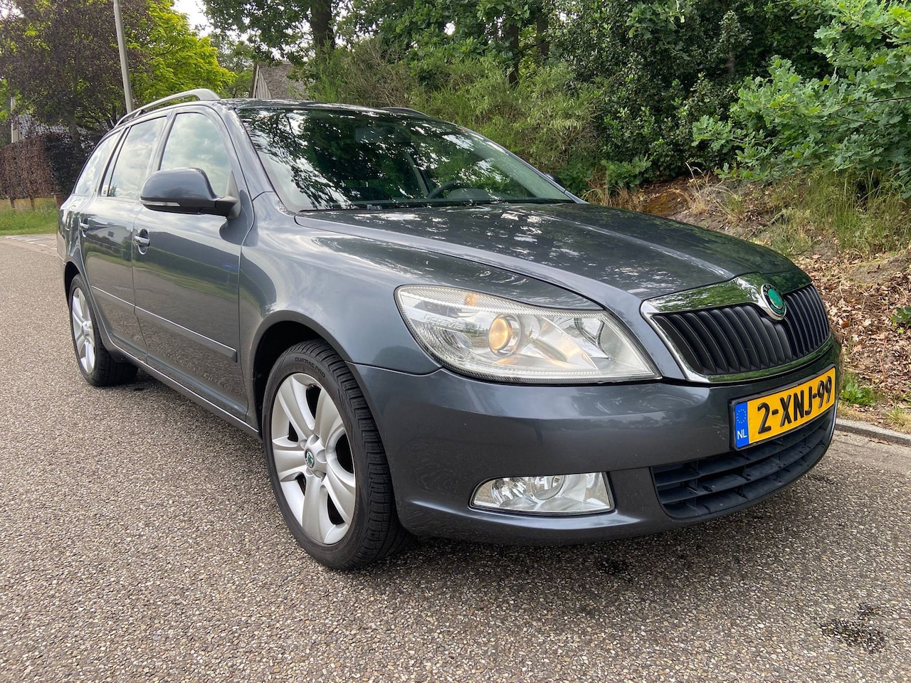 Skoda Octavia Combi - 1.2 TSI Comfort 1.2 TSI Comfort, BJ`2011, APK 08-06-2027 - AutoWereld.nl
