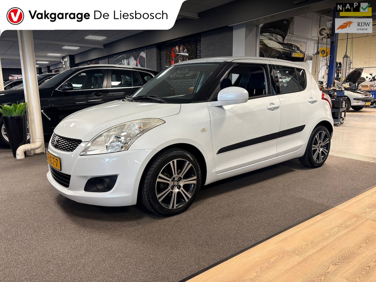 Suzuki Swift - 1.2 Summer EASSS 5deurs /1e eigenaar / airco /stoelverwarming - AutoWereld.nl