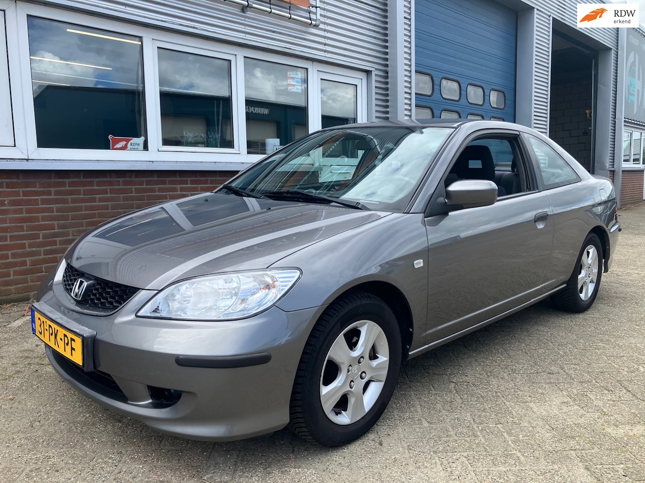 Honda Civic Coupé - 1.7i LS Airco - AutoWereld.nl