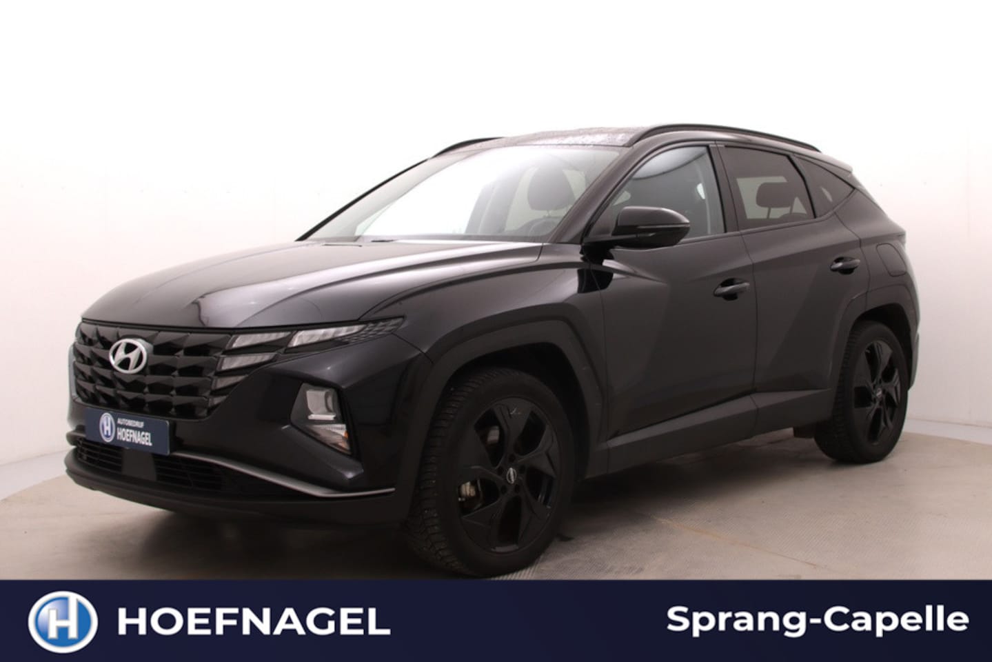 Hyundai Tucson - 1.6 T-GDI PHEV Comfort 4WD | Trekhaak | Camera | Adaptive Cruise | Stoelverwarming | CarPl - AutoWereld.nl