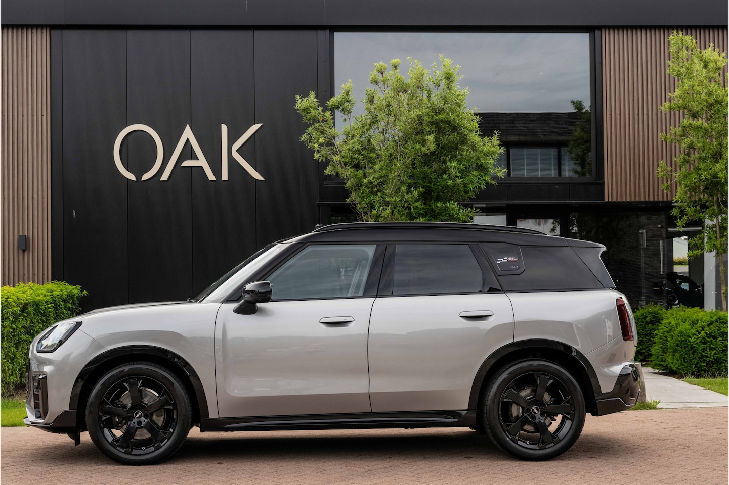 MINI Countryman - 2.0 S ALL4 John Cooper Works XL | Panorama | Leder | Memory | Trekhaak | Melting Silver - AutoWereld.nl