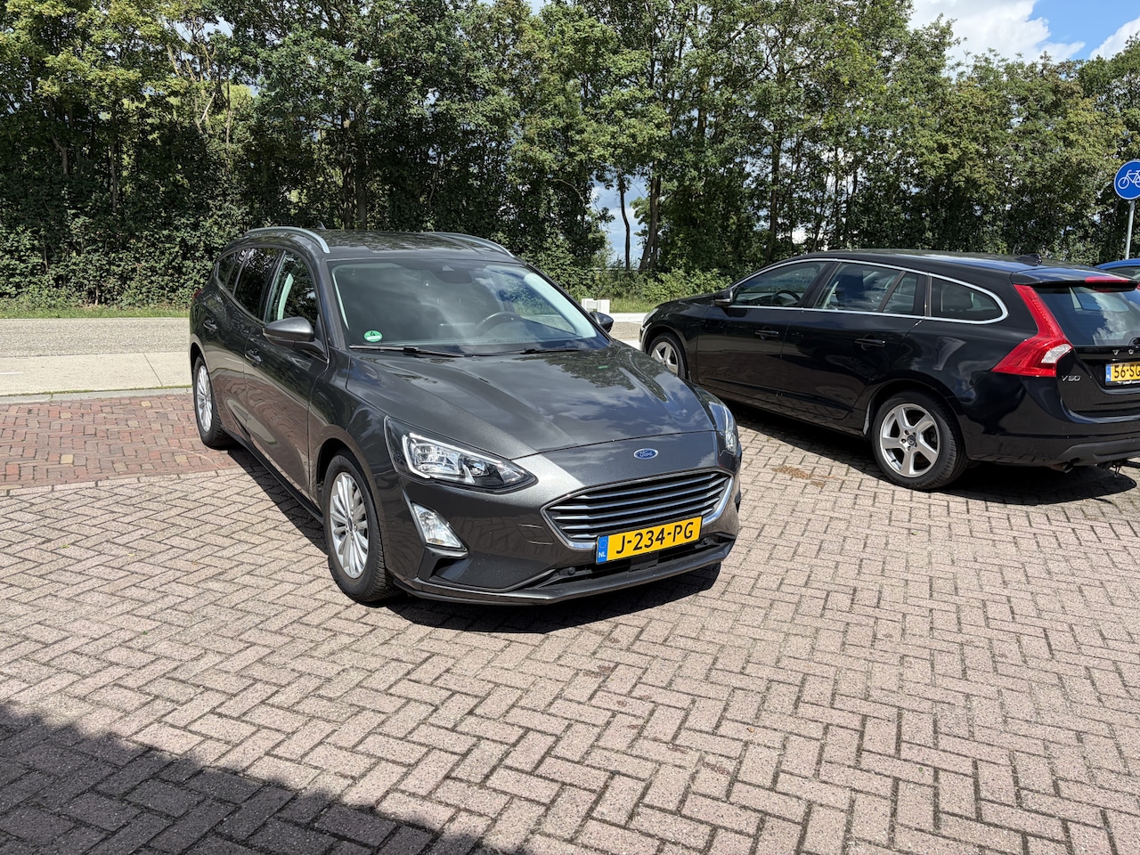 Ford Focus Wagon - 1.0 EcoBoost Hybrid Titanium X Business TREKHAAK CAMERA CLIMA NAVI - AutoWereld.nl