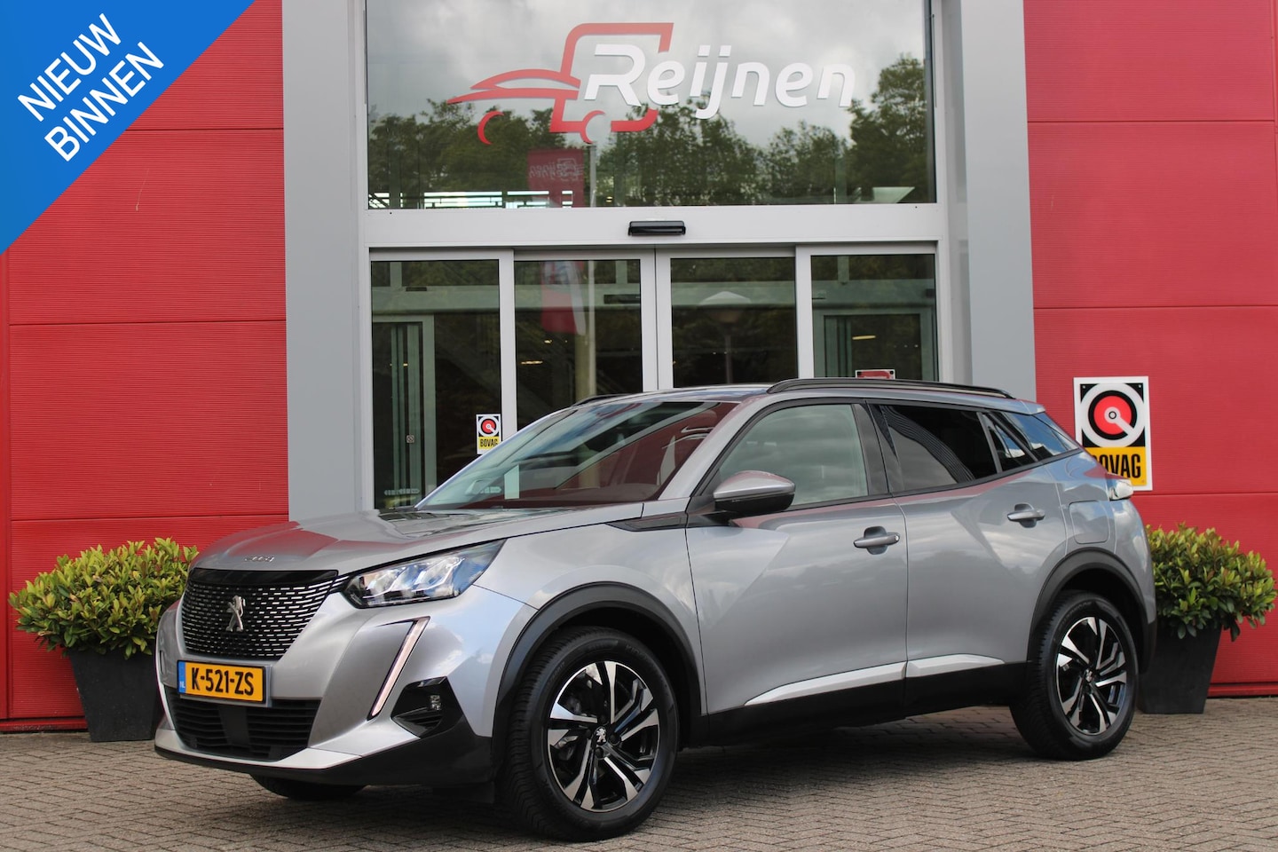 Peugeot 2008 - 1.2 100PK ALLURE PACK | AFNEEMBARE TREKHAAK | ACHTERUITRIJ CAMERA | NAVIGATIE | APPLE CARP - AutoWereld.nl