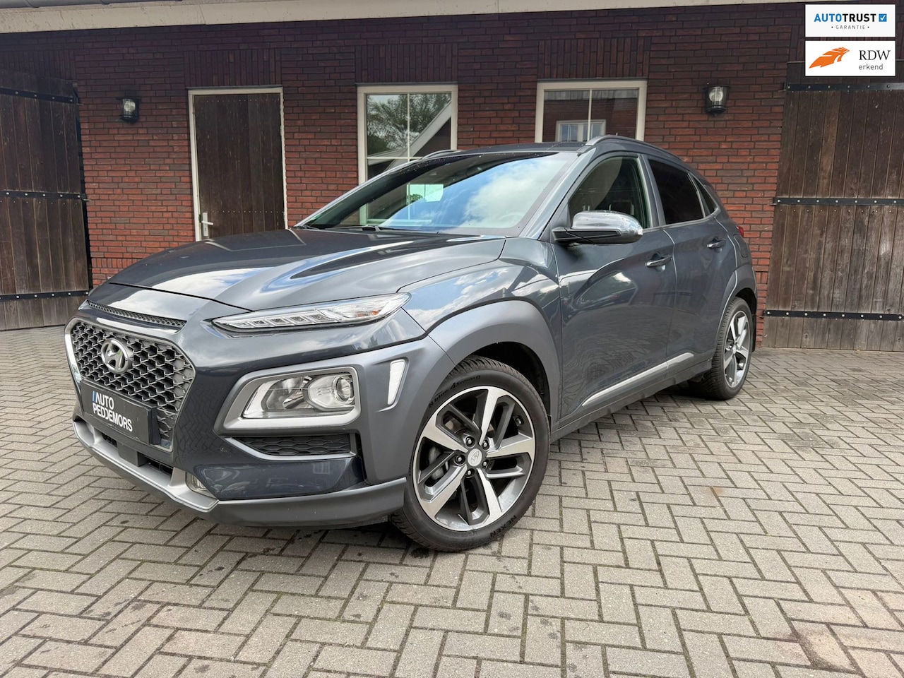 Hyundai Kona - 1.0T Premium| Trekhaak| Elekt. stoelen| Keyless| Stoelventilatie/verwarming - AutoWereld.nl