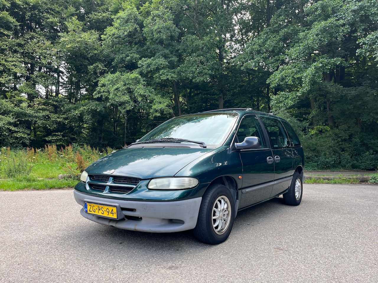 Chrysler Voyager - 2.4i SE 8 passagier - 6 ISOFIX poisties - AutoWereld.nl