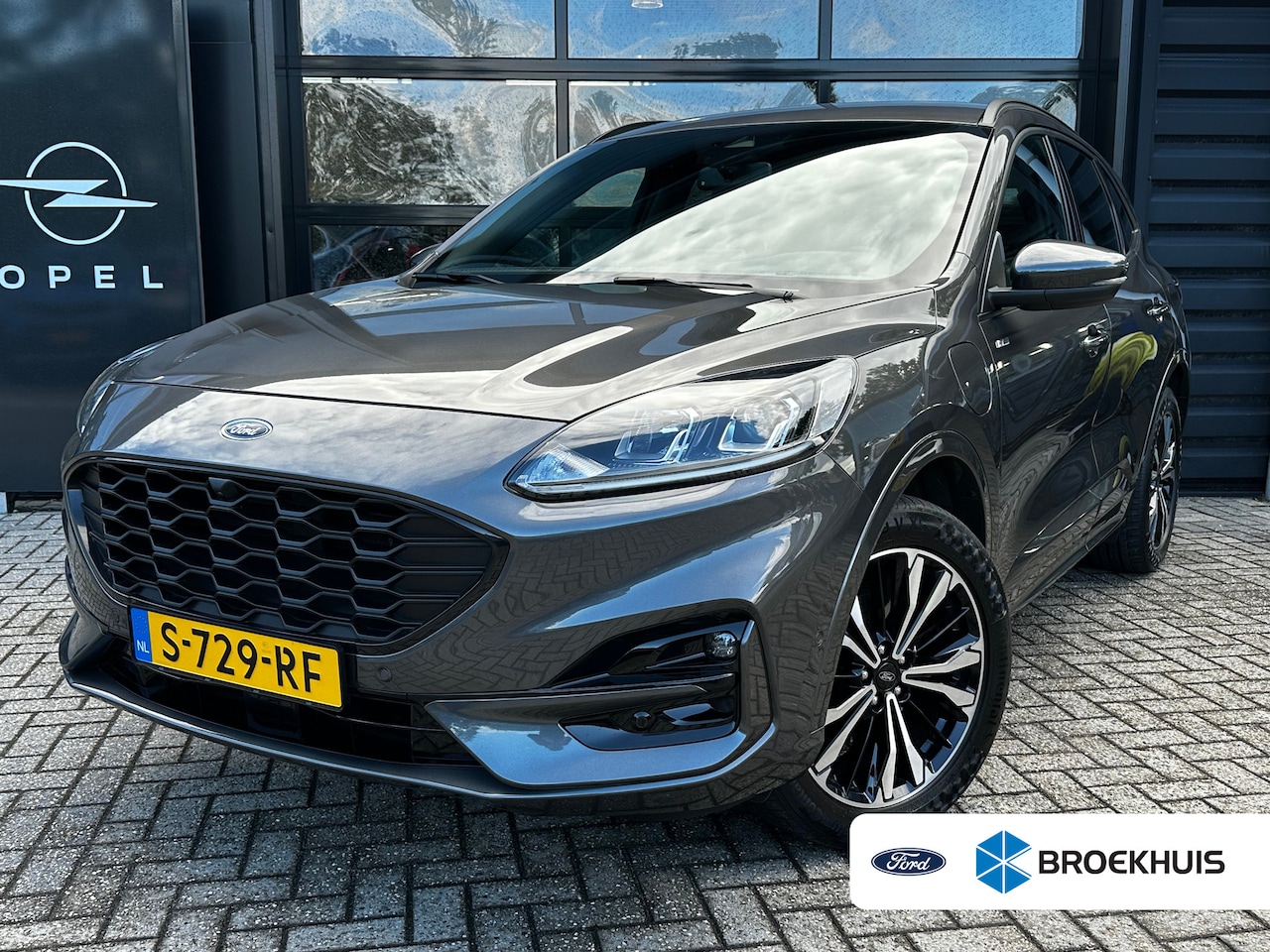 Ford Kuga - 2.5 PHEV 225 PK ST-Line | ELEKTR. WEGKLAPBARE TREKHAAK| STUUR, STOEL, VOORRUIT EN ACHTERBA - AutoWereld.nl