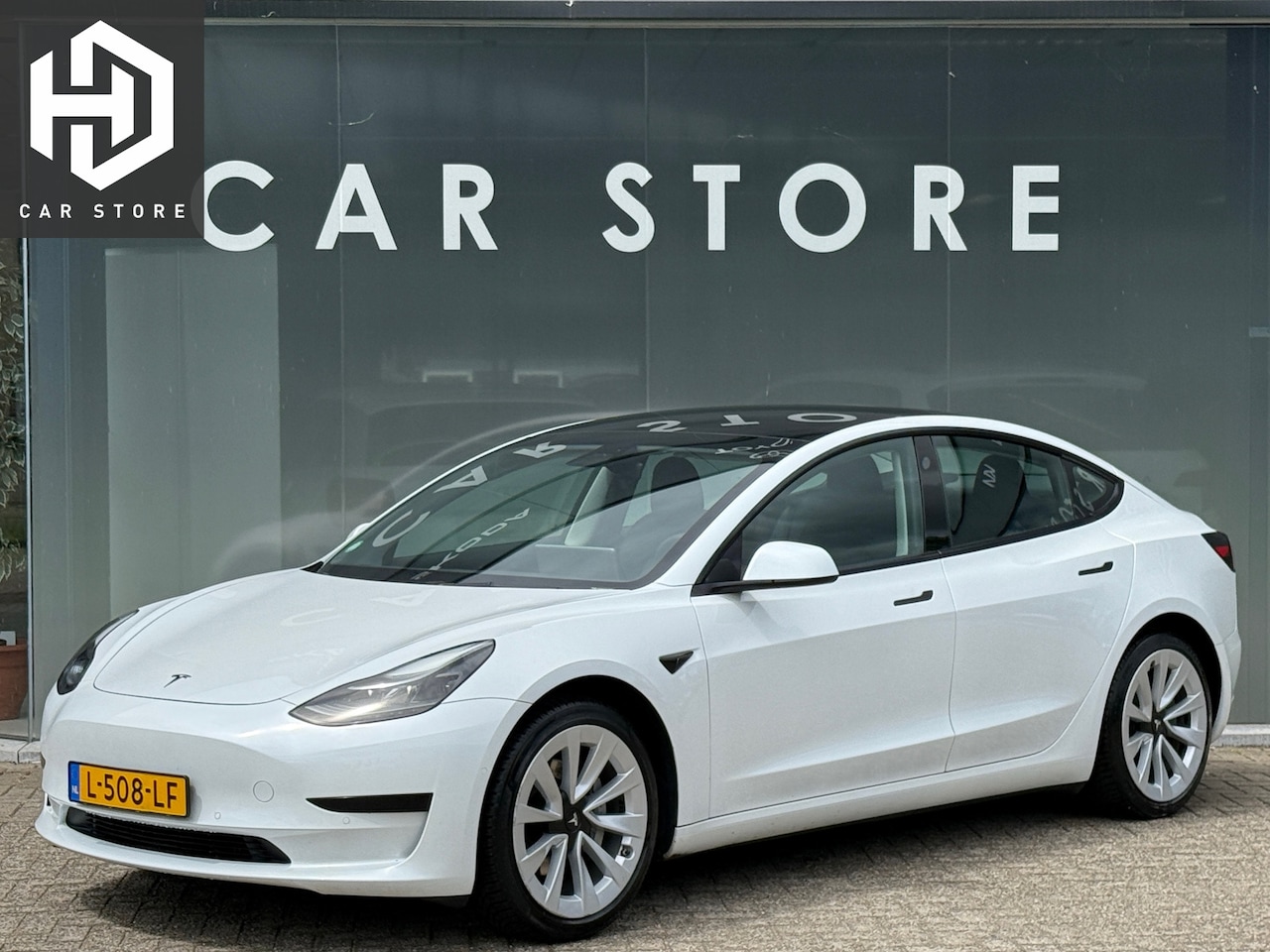 Tesla Model 3 - Standard RWD Plus 60 kWh LFP FACELIFT 93% SOH TREKHAAK AUTOPILOT - AutoWereld.nl