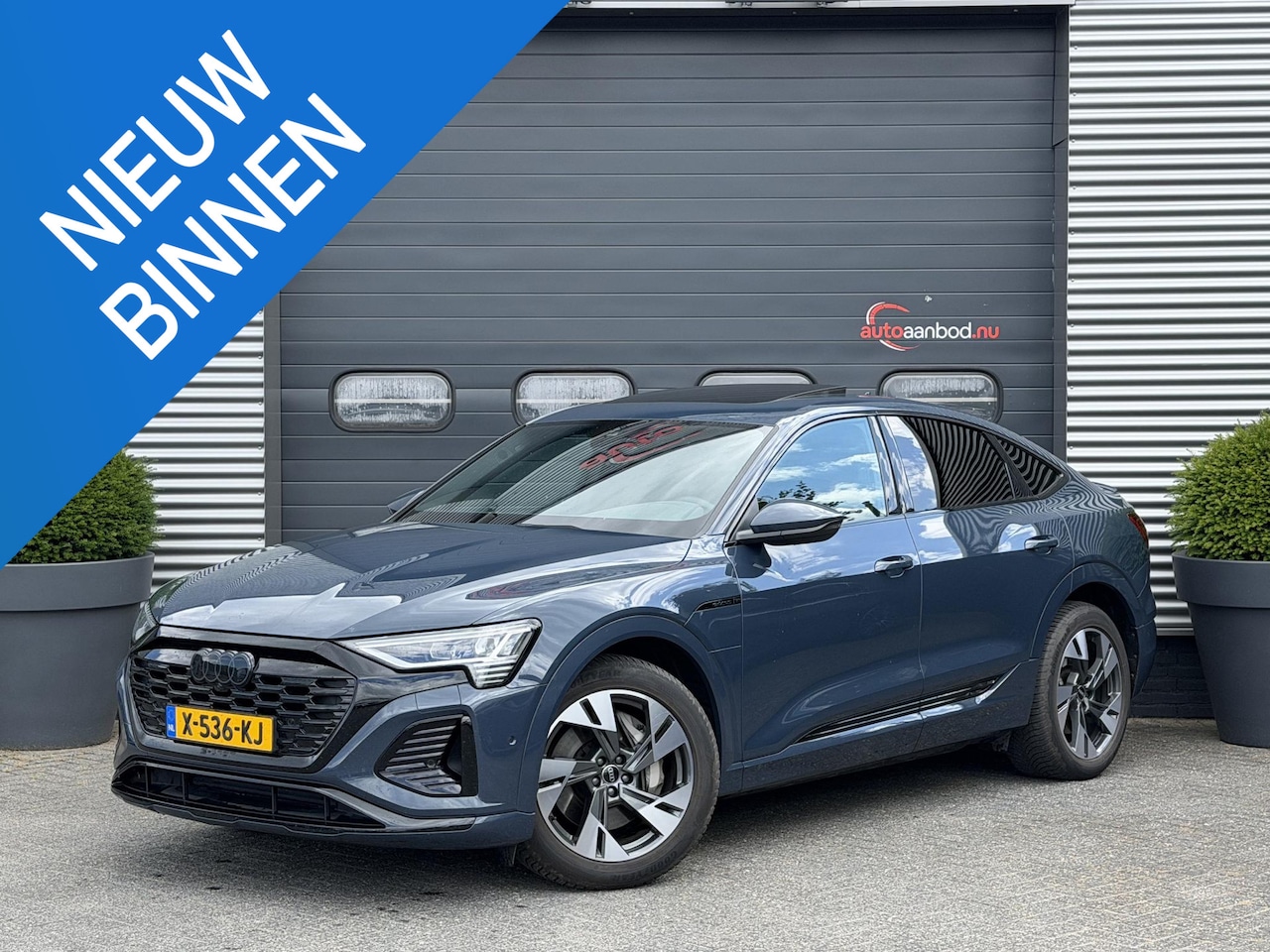 Audi Q8 Sportback e-tron - 55 quattro S Edition Competition 115 kWh | Panoramadak | Luchtvering | Camera | Bang & Olu - AutoWereld.nl